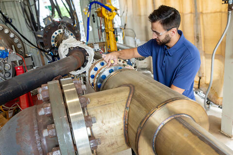 Engineer working in the SwRI High Energy Annex Test  (HEAT) facility