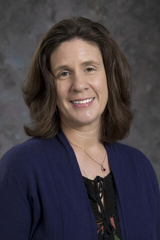 Professional headshot of Kristin Favela