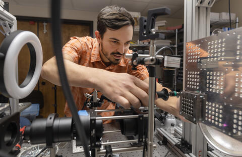 Dr. Daniel Portillo positions a test article for LIPIT testing