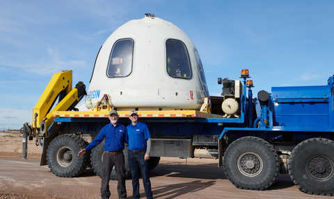 White space capsule sitting on a trailer