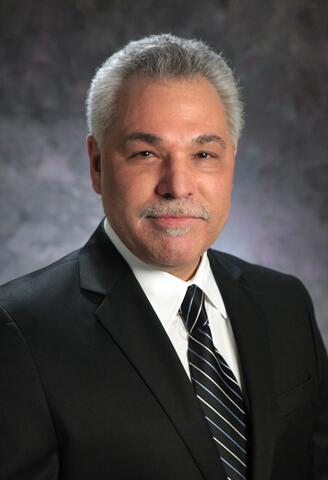 Dr. Christopher J. Freitas