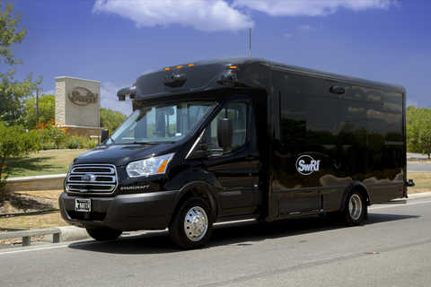 Southwest Research Institute’s automated 14-passenger shuttle parked outside