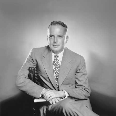 Black & white portrait of Tom Slick Jr.