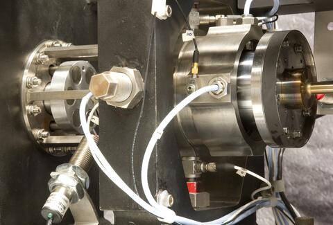 The SwRI-designed 60,000 rpm gas bearing test rig was developed for evaluating the rotordynamic stability of gas bearings.