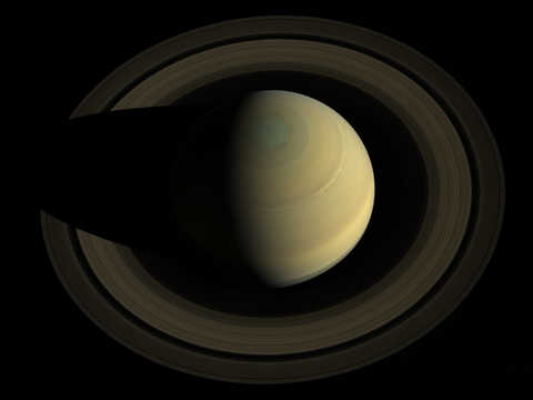 Compilation of Saturn and its rings against black space
