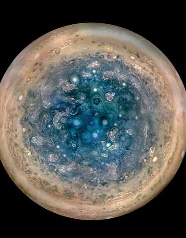 JunoCam aerial image of enormous cyclones swirling around Jupiter's south pole