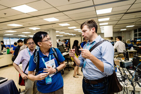 Image: Members of the ROS-Industrial Consortium discuss the new RIC-Asia consortium 