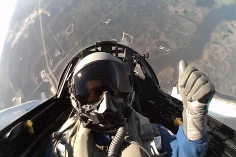 Photo of Dr. Alan Stern undergoing flight training.