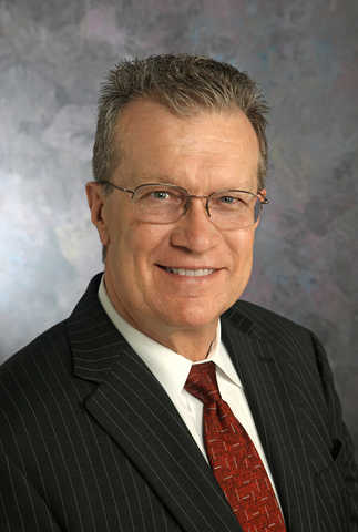 Walter D. Downing, P.E., Executive Vice President and Chief Operations Officer