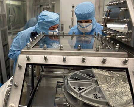 SwRI scientist (left) serves on the OSIRIS-REx sample analysis team