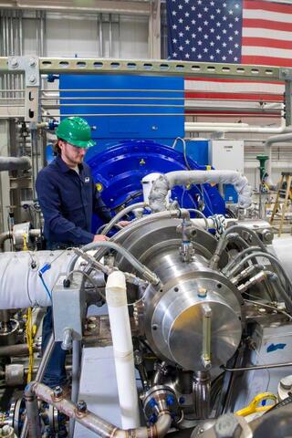Researcher working in the STEP Demo pilot plant