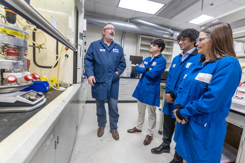 Trinity University and SwRI grant project team in a lab