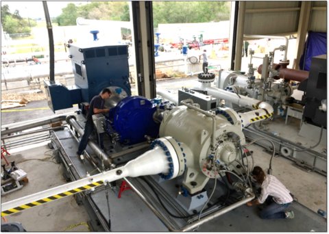 Two staff working in the SwRI Turbomachinery Research Facility