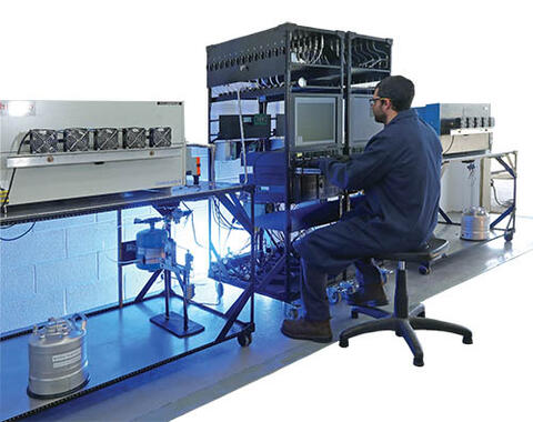 USGR lab with a scientist sitting in front of equipment