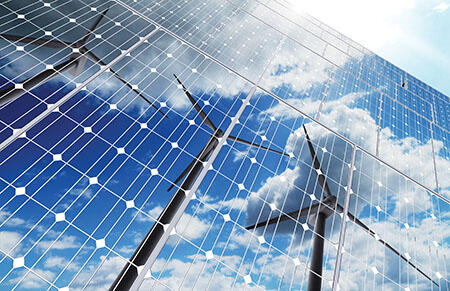 Windmill reflection on glass building