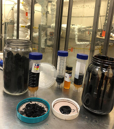 From left to right, biochar, polyurethane pellet feed, biofuel blendstock, and tar 