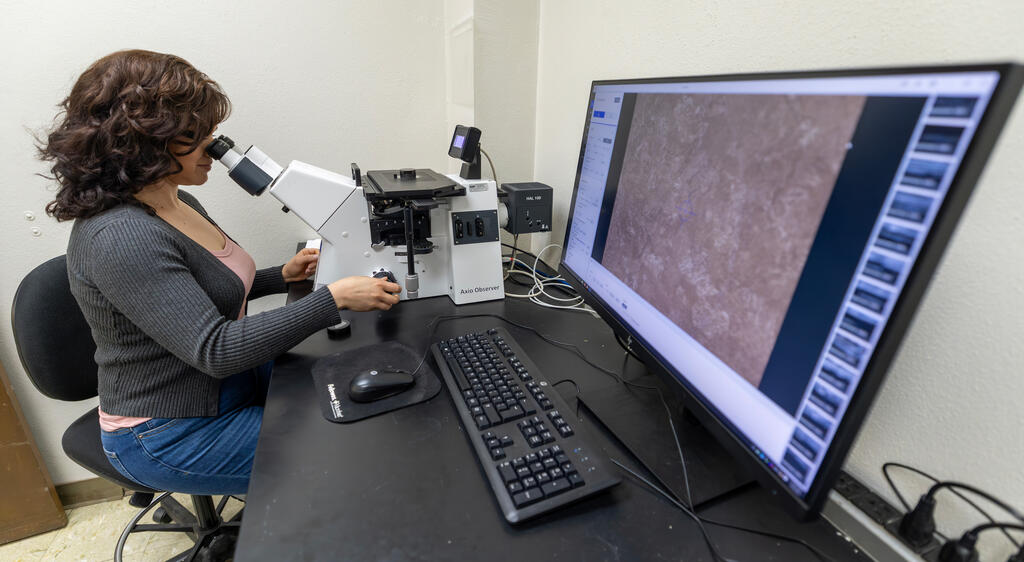 Photo of Mirella Vargas at work station 