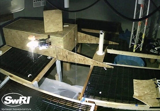 UAS autonomously flying in a confined space containing dripping water.