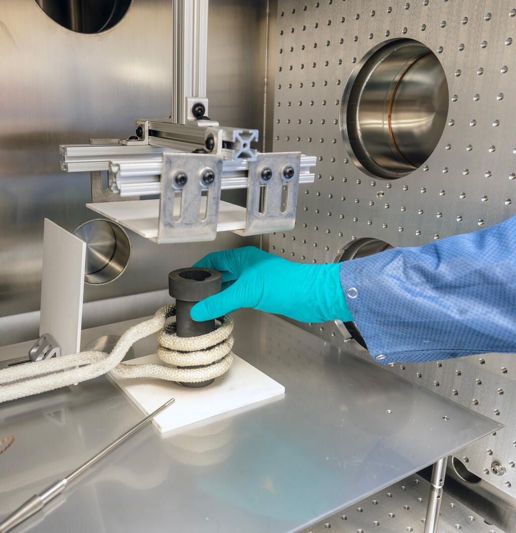 SwRI staff working on space equipment coil in Plant-X facility