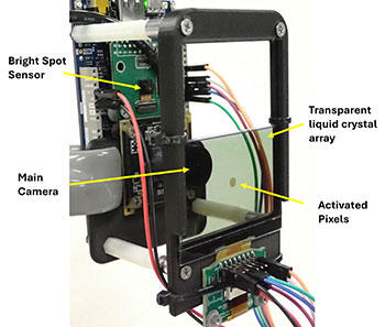 Demonstration hardware for DLMENV showing it blocking a bright spot in the field of view.