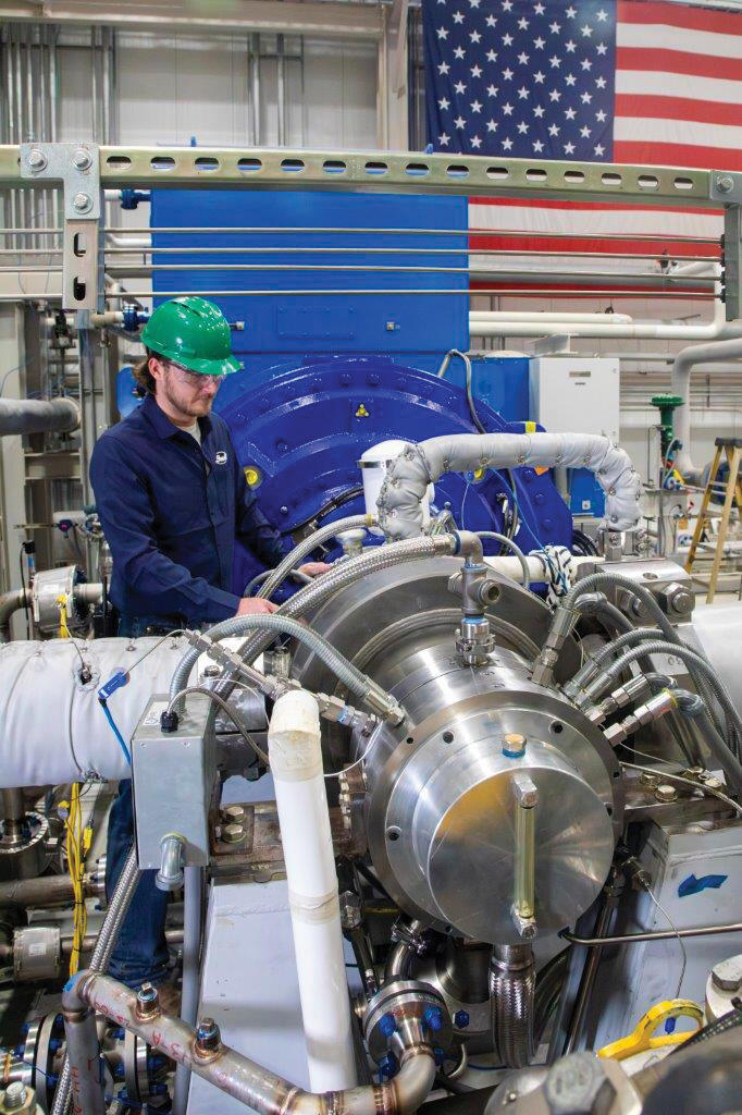 SwRI staff working on engine in 5 Step Facility 