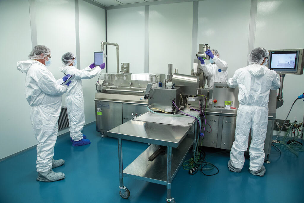 SwRI staff working in clean room