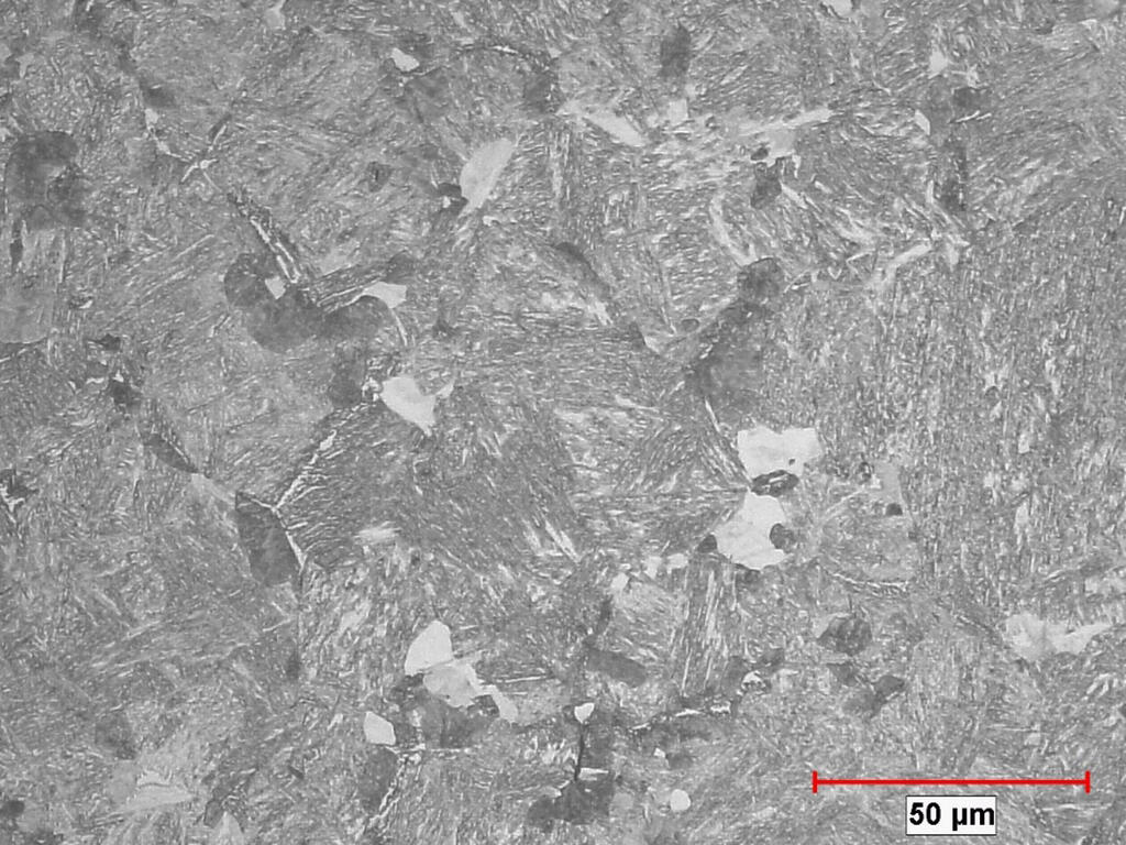 Microscope image of a hard microstructure of steel alloy with more intense heat treatment