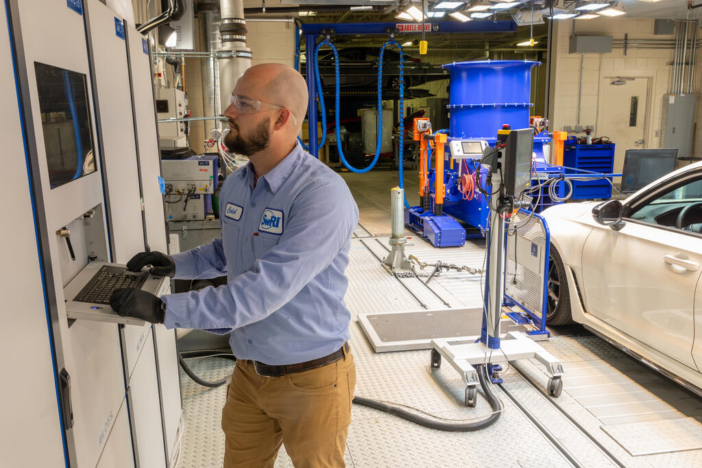 SwRI staff at computer running dyno testing