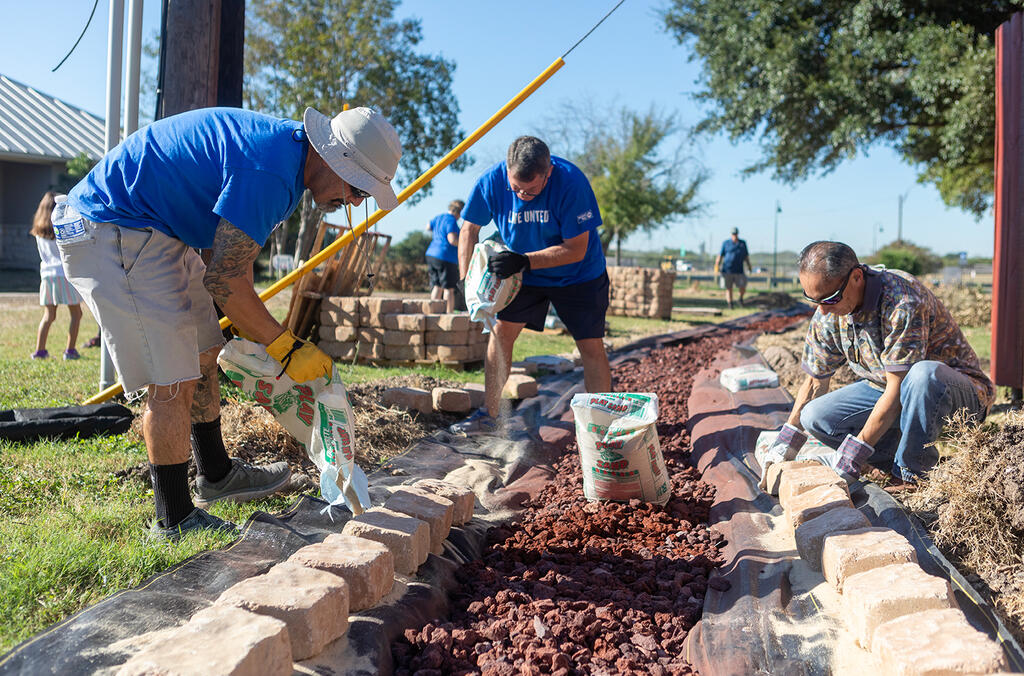 volunteers working on a path at Mission Road Ministries 