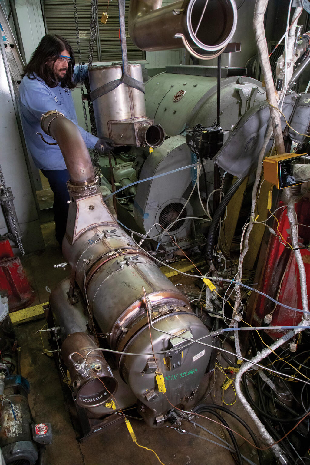 SwRI staff working on converting NOx into harmless water and nitrogen