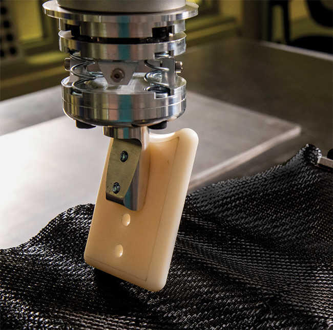 robot placing composite sheets