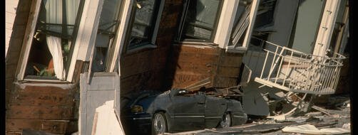 Automobile crushed under building after 1989 Loma Prieta earthquake in California