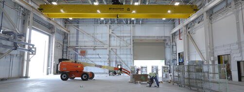 Technician working inside the STEP Pilot Plant 