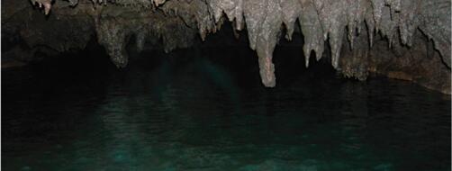 clear underground water inside a cave called Honey Creek Cave near San Antonio