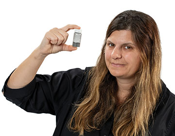 Vicky Poenitzsch holding a vial of platelet powder